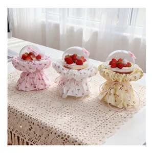 Detail of cake bouquet packaging DIY kit in pink, white, and yellow colors