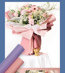 Detail of double-sided waterproof flower wrapping paper in pink and purple for bouquets