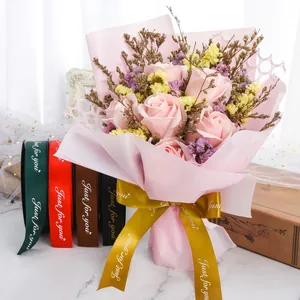 Detail of 2.5cm satin ribbons with Just for You print used on a flower bouquet