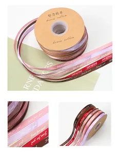 Detailed macro view of 2.5cm decorative satin ribbons with Just for you print