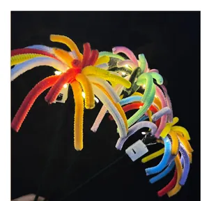 Close-up detail of colorful glowing DIY pipe cleaner firework craft for New Year gifts