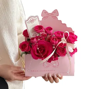 Pink envelope-style floral gift box for romantic flower arrangements and DIY crafts