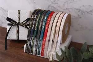 Collection of 1cm wide gold-stamped grosgrain ribbons featuring Love Is Eternal print