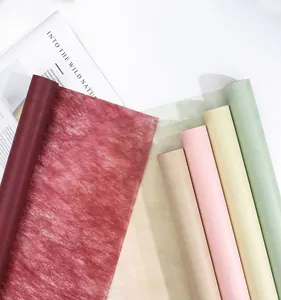 Detail view of colorful milk cotton non-woven waterproof flower wrapping paper rolls