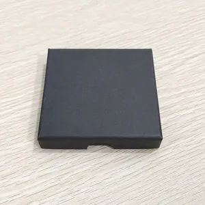 Slim matte black square jewelry gift box for necklace and earrings on wood background
