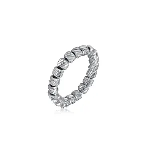 Close-up of stainless steel elastic ring featuring textured diagonal striped beads