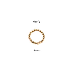 Detalle de anillo elástico con cuentas de acero dorado de 4mm para hombre básico