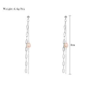 Detailed view of long stainless steel chain earrings with pink freshwater pearls, 8cm length.