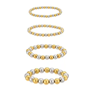 Detail view showing four sizes of two-tone stainless steel beaded elastic bracelets