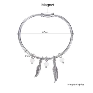 Detail of 304 stainless steel spring bracelet with feather charms and magnetic clasp