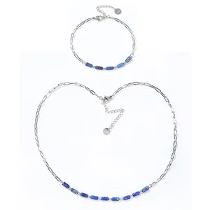 Detailed macro view of the stainless steel link chain set featuring blue lapis lazuli stone beads