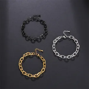 Set of three stainless steel beveled chain bracelets in gold, silver, and black finish.