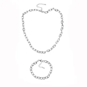 Detailed view of silver stainless steel chunky cross chain necklace and bracelet set