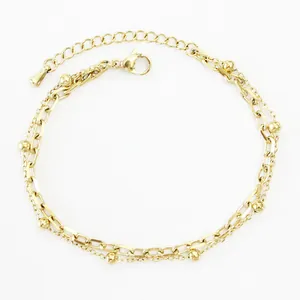 Detailed view of gold stainless steel double-layer chain bracelet with delicate beads