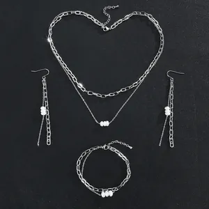Set gioielli in acciaio inox a doppia catena con perle d'acqua dolce: collana, bracciale, orecchini