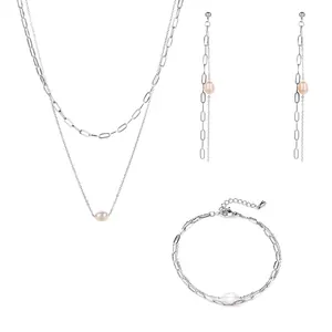 Detailed view of freshwater pearl jewelry set featuring stainless steel layered chains