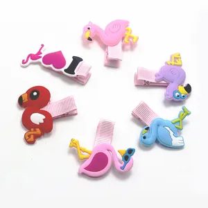 Set di sei fermagli per capelli fenicottero in PVC con nastro rosa