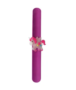 Detail view of a purple silicone slap bracelet with a cute cartoon unicorn charm.