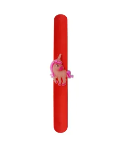 Red flexible silicone slap bracelet featuring a cute pink cartoon unicorn charm