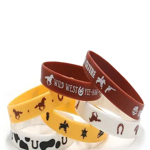 Cowboy theme silicone wristbands with Wild West patterns and text for party favors