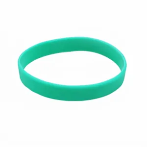 Close-up of plain green glow-in-the-dark silicone wristband for sports and events