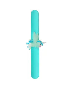 Close-up detail of a glow-in-the-dark cartoon unicorn on a turquoise silicone slap band