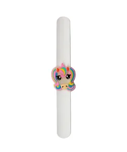 Close-up detail of a white noctilucent silicone slap bracelet with a cute cartoon unicorn