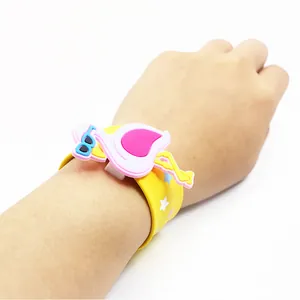 Detailed view of flamingo slap bracelet with colorful star patterns on yellow band