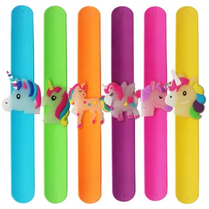 Set of six colorful luminous silicone slap bracelets with cute cartoon unicorn designs.
