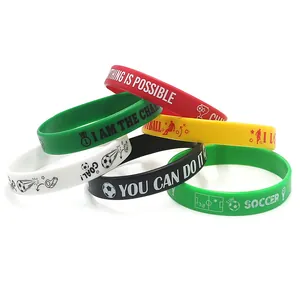 Set of colorful silicone sports wristbands with soccer slogans for party favors and gifts