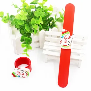 Festive Christmas snowman slap bracelet featuring a red silicone strap for party favors