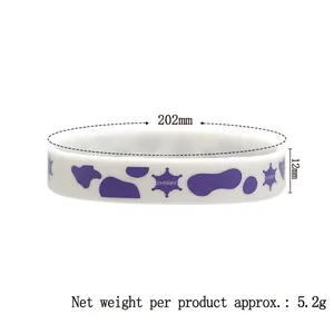 Cowboy theme white silicone wristband with purple cow print and sheriff star design
