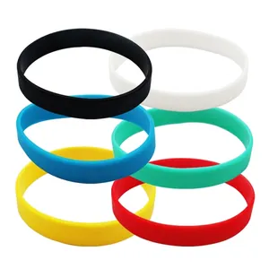 Set of six multi-colored luminous silicone wristbands for sports and events