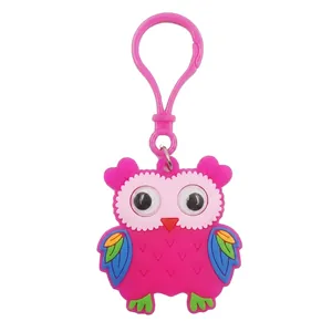 Vibrant pink cartoon owl keychain made of soft PVC as a cute bag charm accessory
