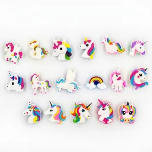 A variety of colorful PVC unicorn and rainbow themed charms for small gift accessories