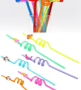 Detail view of colorful reusable curly straws with princess and castle charms