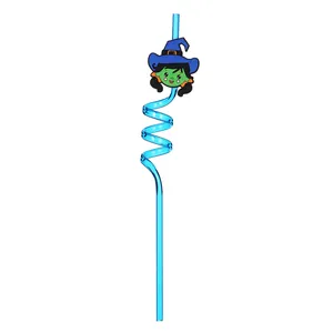 Close-up of a translucent blue spiral Halloween straw featuring a cute cartoon green witch topper