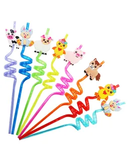 Colorful reusable spiral straws with farm animal toppers for birthday party favors.