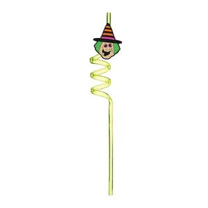 Close-up detail of reusable lime green spiral straw with a cartoon witch accessory