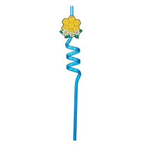 Close-up of blue spiral straw with cartoon honeycomb and daisy flower decoration