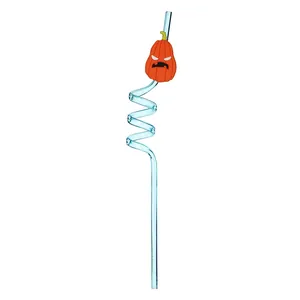 Macro view of blue spiral drinking straw featuring festive orange pumpkin character.