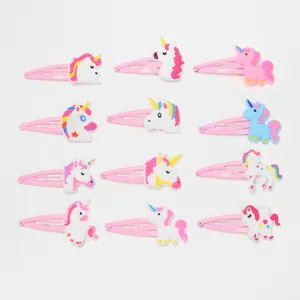 Detailed top view of twelve colorful cartoon unicorn snap hair clips for kids party favors