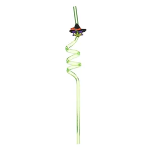 Green spiral reusable Halloween straw featuring a cute cartoon witch hat accessory