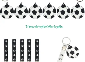 Detailed view of silicone soccer keychains featuring black and white ball patterns