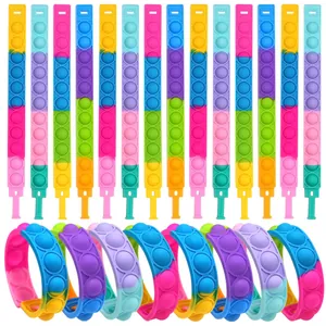 Set di braccialetti pop-it colorati in silicone per alleviare lo stress e gioco.