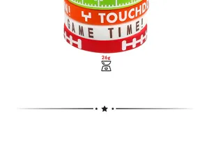 Close-up detail of football themed silicone wristbands with weight marking at 26g
