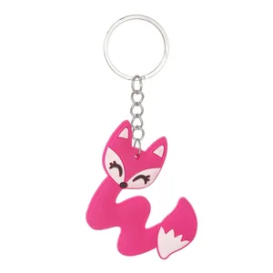 Detailed macro shot of a vibrant pink fox letter S keychain crafted from soft PVC.