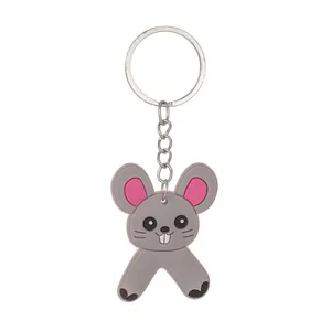 Close-up detail of a cute gray PVC mouse animal alphabet keychain for party gifts