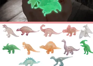 Collection of twelve luminous mini dinosaur figurines showcasing variety and glow effect