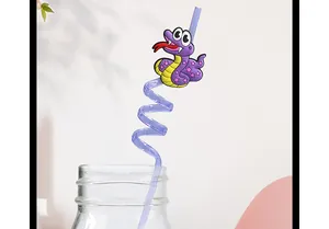 Detail of cute purple cartoon snake accessory on spiral drinking straw